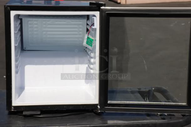 Brand new Galaxy CRG-2 black customizable countertop refrigerated merchandiser. 1.8 cu ft, open door view, minor scratch on glass.