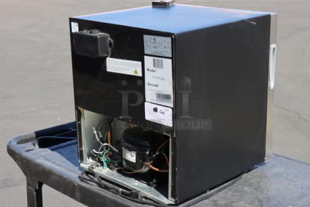 Galaxy CRG-2 countertop refrigerated merchandiser, 1.8 cu ft, scratch-n-dent, black, serial no. 05224040450100438, rear view with open panel showing components.