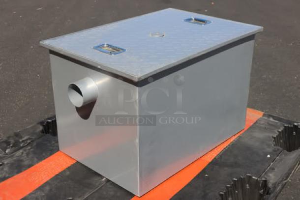 BRAND NEW Regency 600GT25 50 lb. grease trap, 25 GPM, 3" non-threaded connections, minor scratches, silver finish.