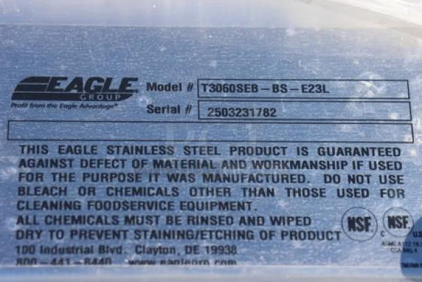 Eagle Group T3060SEB-BS-E23L stainless steel work table label with model and serial numbers, product guarantee, and care instructions.