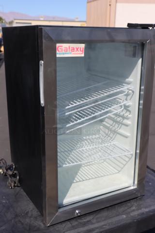 Brand new Galaxy CRG-3 black refrigerated merchandiser, 2.5 cu ft, customizable countertop, glass door, visible serial no. 06824112110100020.
