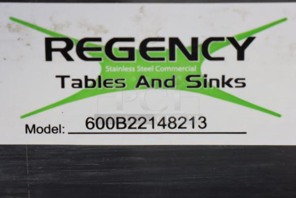 Regency 600B22148213 model label for 48" x 21" two bowl underbar sink with dual 13" drainboards, new condition.