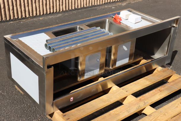 Brand new Regency 600B22148213 underbar sink, 48" x 21" with two bowls and 13" drainboards, missing packaging.