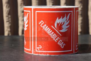 Lavex 4" x 4" flammable gas label roll, model 323SHIP4X4NF. Brand new, 500 per roll, red with flame icon.