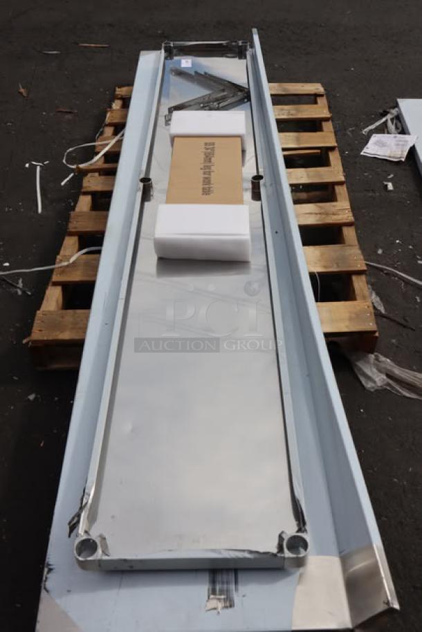 BRAND NEW Regency 600TSSB30120 30"x120" stainless steel work table with 4" backsplash, undershelf, in scratch-n-dent condition.