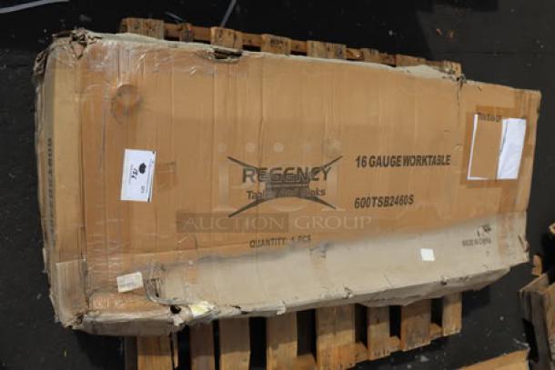 Regency 24" x 60" stainless steel work table in damaged packaging. Model 600TSB2460S, may have scratches or dents.