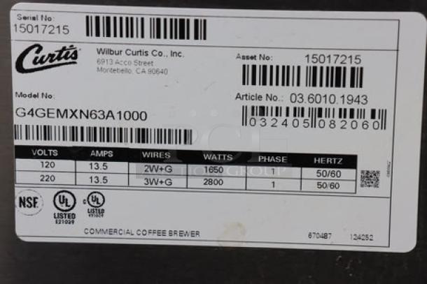 Curtis G4GEMXN63A1000 coffee brewer label, Serial No. 15017215, with specs: 120/220V, 1650/2800W, minor dings on the side.