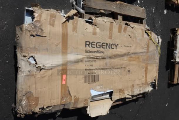 Regency 600T3072G commercial work table package, damaged box, label visible indicating model and brand.