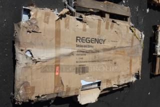 Regency 600T3072G commercial work table package, damaged box, label visible indicating model and brand.