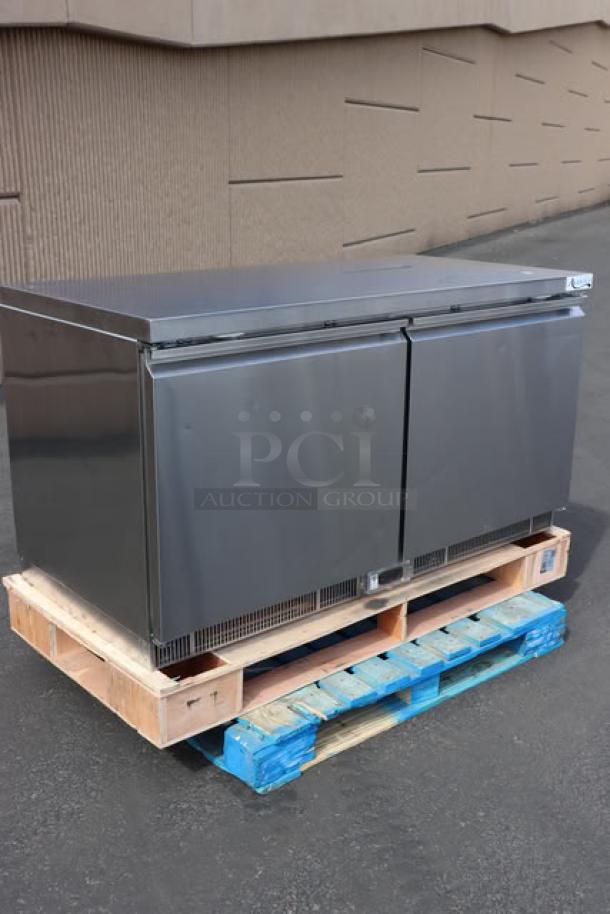 Avantco ZUC60RHC 60" undercounter refrigerator, stainless steel, minor dents, on pallet, no original packaging.