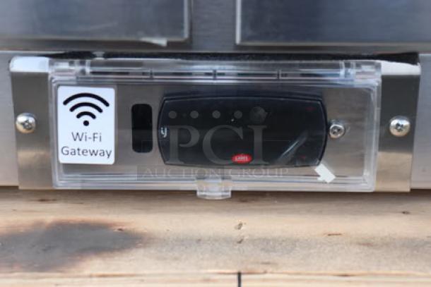 Avantco ZUC-60R-HC undercounter refrigerator; front view of Wi-Fi gateway feature; new, minor dents possible.