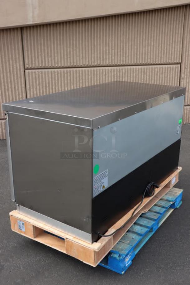 Avantco ZUC60RHC 60" undercounter refrigerator, new, out of packaging, minor dents, serial 765720511, on pallet.