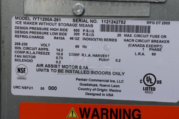 BRAND NEW Manitowoc IYT1200A-261 Indigo NXT ice machine, air-cooled, cracked plastic top, minor dents, 208-230V, 1213 lb capacity.