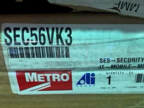 Brand new Metro SEC56VK3 security cage cart, green epoxy, fully assembled, visible labels showing model and brand.