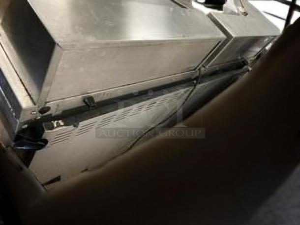 Continental Refrigerator sandwich/salad prep table with dual lids, superb condition, 115V, stainless steel construction.