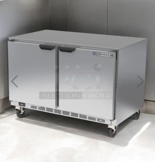 Beverage-Air undercounter refrigerator, stainless steel, two-door, 115V, great condition, caster wheels, fully tested, branded logo visible.