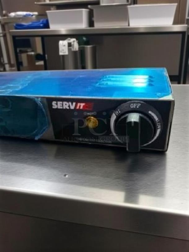 Brand new ServIt 30" Single Strip Warmer, model 402SIP130GF, in original box, 120V, never used, control panel visible.