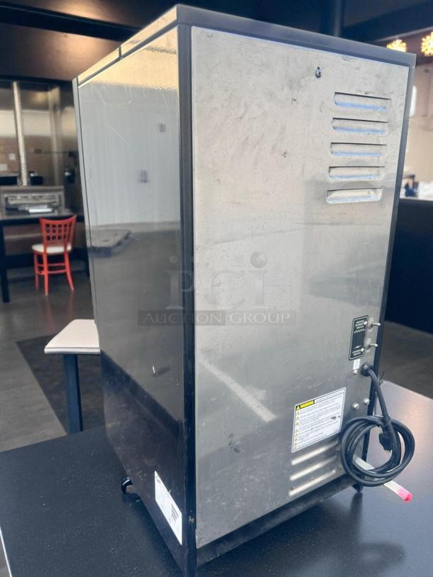 Wilbur Curtis PC-4D-10-01 4-flavor cappuccino dispenser, stainless steel, superb condition, 120V, fully tested, visible labels.