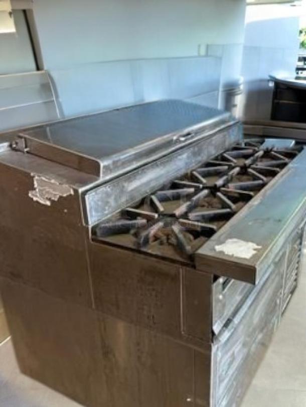 Southbend S36D gas range with 6 burners, standard oven, and refrigerated base. Natural gas; fully tested and operational.