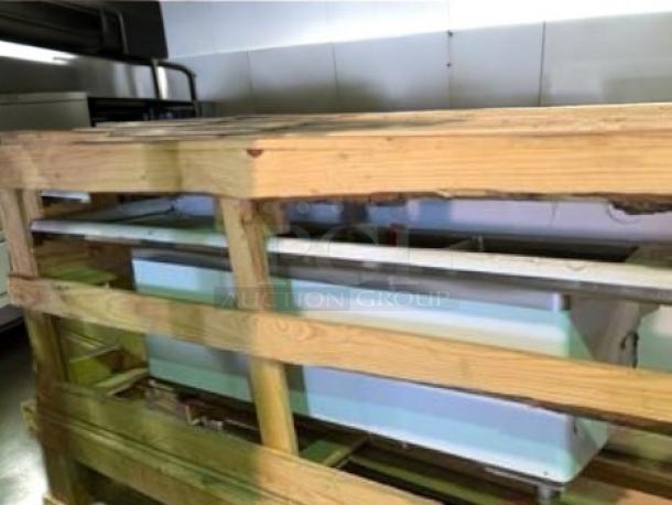 Fenix FC-3-1515-15RL stainless steel sink in superb condition with triple compartments and dual 15" drainboards, on wooden pallet.