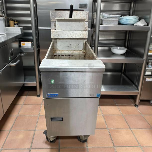 Pitco SG14-S stainless steel gas fryer, 40-50 lb. capacity, 110,000 BTU, fully tested, showing wear, Pitco logo visible.