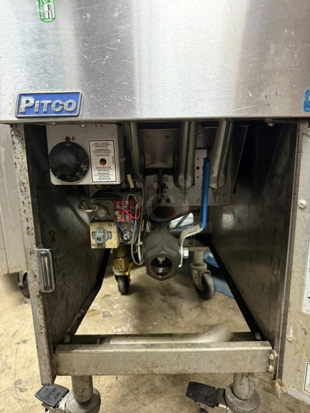 Pitco SG14-S floor fryer, stainless steel, 40-50 lb capacity, 110,000 BTU, fully tested, showing inner mechanics and labels.