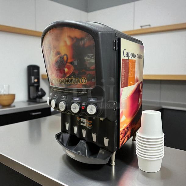 Grindmaster PIC5 beverage dispenser in outstanding condition, offering 5 flavors. Fully tested and working, 120V.