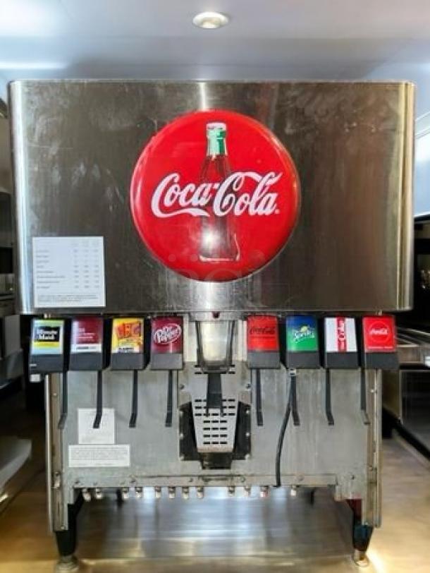Lancer 4500 ice beverage dispenser, 8-valve, Coca-Cola branded, excellent condition, 115V, fully tested, operational.