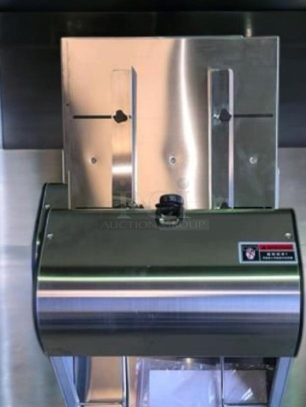 Commercial Food Equipment 302N-20mm automatic bread slicer in superb condition, 110V, fully tested and working.