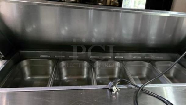 Turbo Air MST-72-N refrigerated prep table, stainless steel finish, excellent condition, fully tested 115V unit.