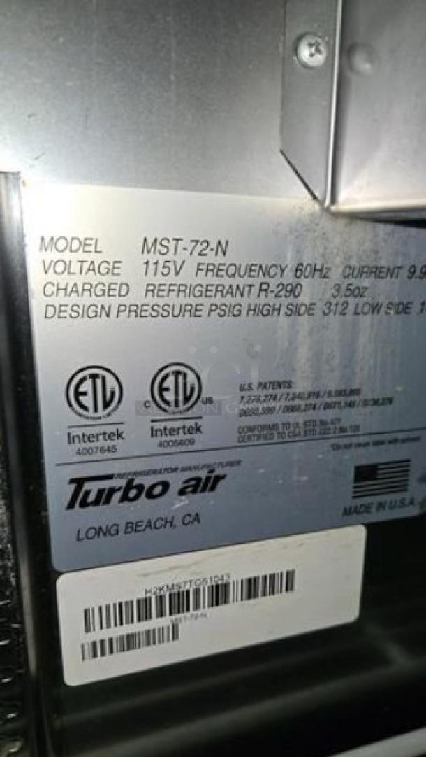 Turbo Air MST-72-N label showing model, 115V voltage, 60Hz frequency, and refrigerant R-290. Made in USA.