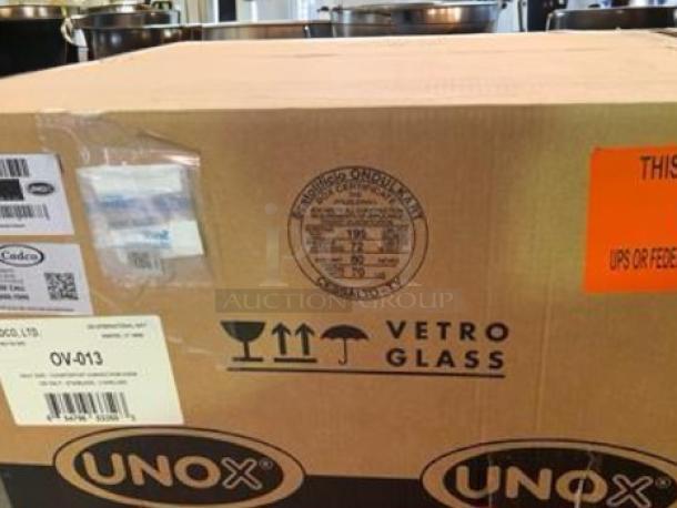 Brand new Cadco OV-013 half-size convection oven, unopened in box. Model OV-013, stainless steel, 120V. Factory-sealed packaging.