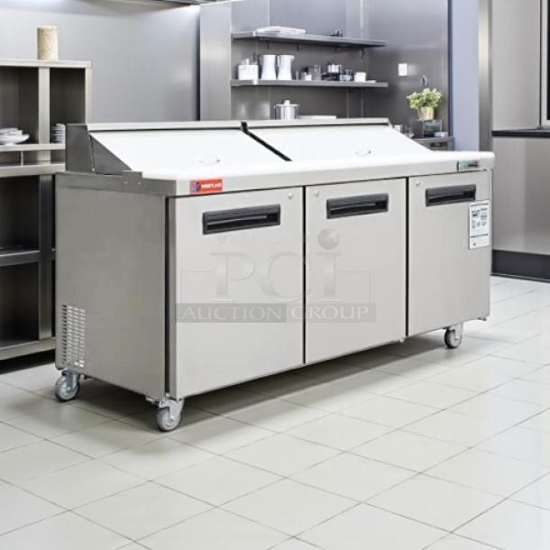 Titan Refrigeration XTSU72 72" sandwich prep table in excellent condition. Features a stainless steel exterior and three compartments.