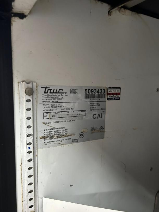 True TWT-27F-HC tag showing model details, serial number 5093433, and specifications. Made in USA label included.