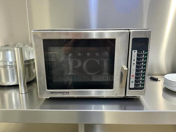 Menumaster MFS18TS 1800W microwave, stainless steel, great condition, tested and working. Keypad and branding visible.