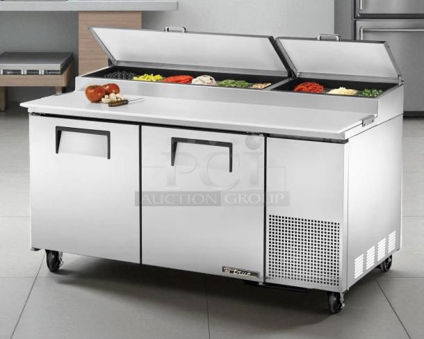 True TPP-AT-67-HC refrigerated pizza prep table in excellent condition, features dual doors, tested and working.