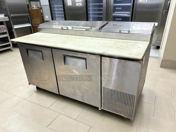 True TPP-AT-67-HC refrigerated pizza prep table, excellent condition, stainless steel, 2 doors, 67 3/8" wide.