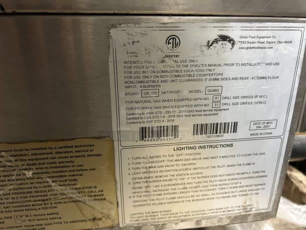 Alt text: Globe GG48G 48" gas griddle label showing model info, specs, and lighting instructions. Date of manufacture: Dec-2021.
