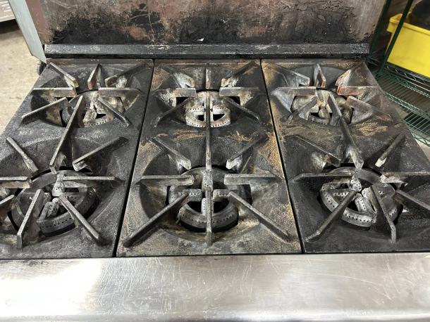 American Range AR-6 36" commercial gas range with 6 burners, standard oven; tested, working, shows signs of use.