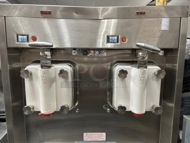 Taylor 321-27 soft serve machine, excellent condition, dual-flavor, fully tested, 208/230V, visible controls, front view.