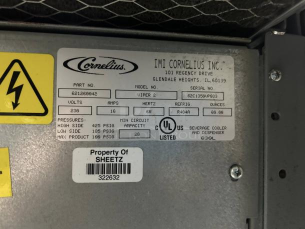CORNELIUS VIPER 2 drink machine label showing model details, 230V, 16A, R404A refrigerant, UL listed. Property of SHEETZ.