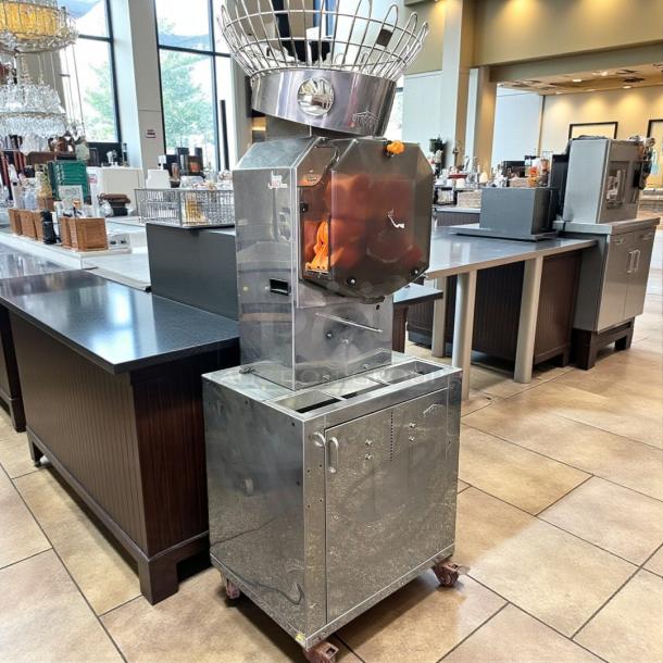 Citrocasa 8000SB automatic orange juicer, stainless steel, tested and working, 115V, "AS IS" condition, visible juicing setup.