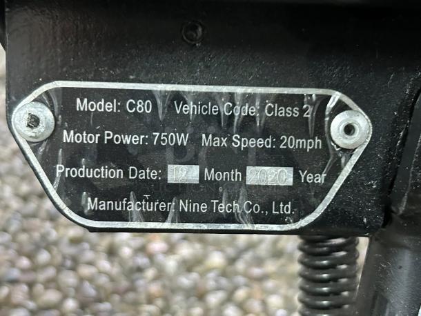 Segway C80 e-Moped Scooter label showing details: Class 2, 750W power, max speed 20mph, made by Nine Tech Co., Ltd., Dec 2020.