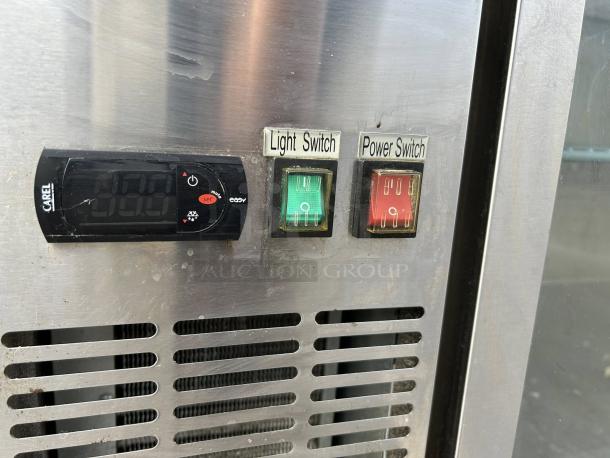 Avantco UBB-48G-HC-S control panel, featuring Carel digital display, light switch, and power switch on stainless steel surface.