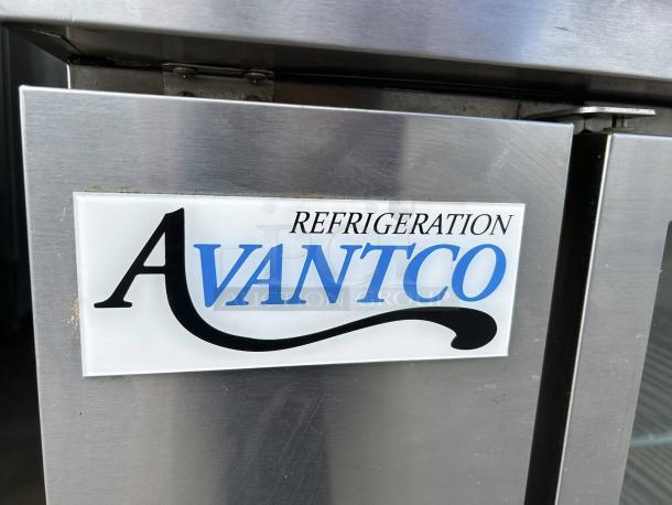Avantco UBB-48G-HC-S stainless steel refrigerator, glass door, LED lighting, brand label visible, in working condition.