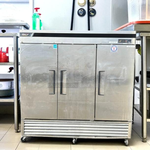 Turbo Air TSR-72SD-N fridge, 82" bottom-mounted, three solid doors, LED lighting, excellent condition, tested and working.