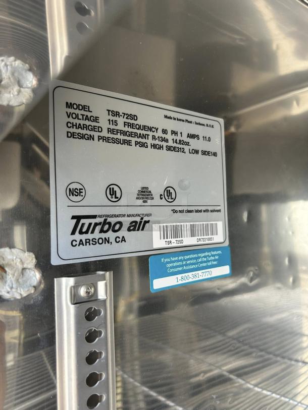 Turbo Air TSR-72SD-N model label with voltage, frequency, and refrigerant details on stainless surface; NSF and UL certified.