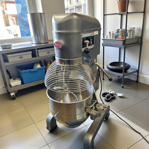 Avantco MX30 30 Qt. Planetary Floor Mixer, stainless steel, with safety guard and controls, tested and working, in kitchen setting.