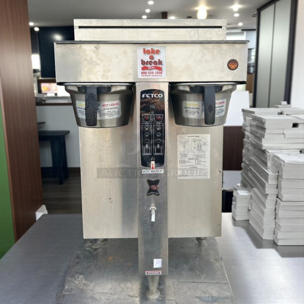 Fetco CBS-2052e dual station coffee brewer, excellent condition, fully tested, 208-240V, visible controls and labels.