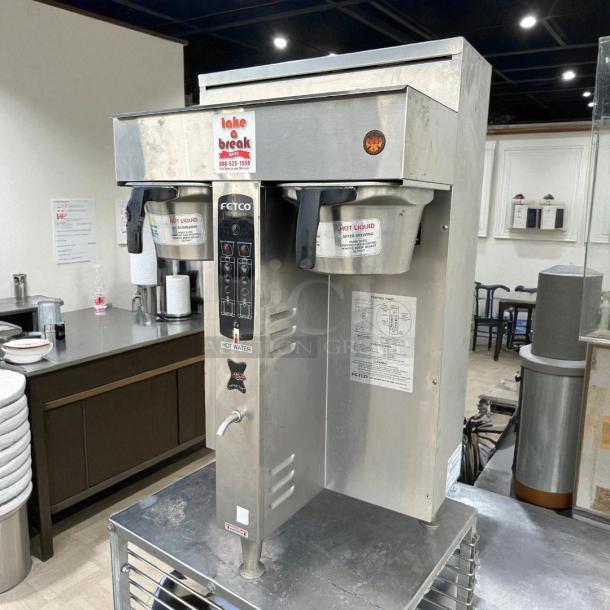 Fetco CBS-2052e dual station coffee brewer, 208-240V, stainless steel, fully tested, excellent condition, visible control panel.